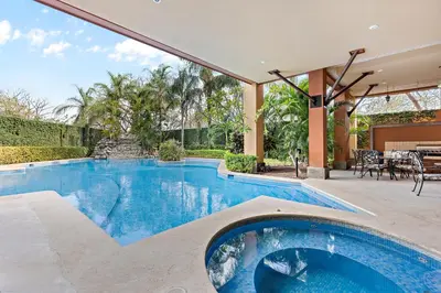 a swimming pool in a house at Casa feng shui in Tamarindo