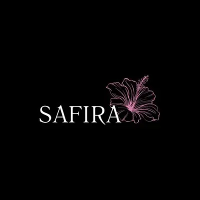 a pink flower on top of a black background at The SAFIRA Dome at FéLIZA Rainforest Domes in Monteverde Costa Rica