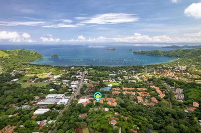 an aerial view of a city and a lake at Coco Top-Floor 3-BD Ocean-View Unit at Pacifico By SPCR in Coco