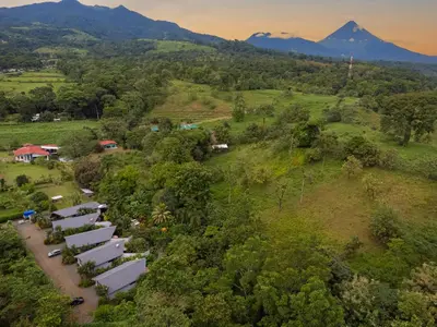 an aerial view of a group of tents on a hill at Bukala Village Lodge in San Ramón