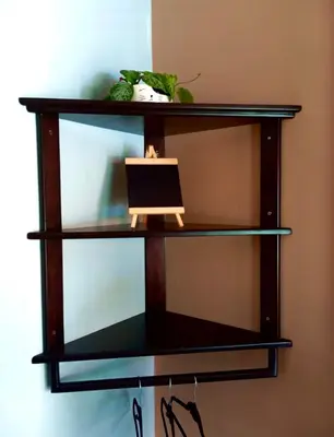 a black shelf with a laptop on it at Habitaciones Kolibri in Quepos