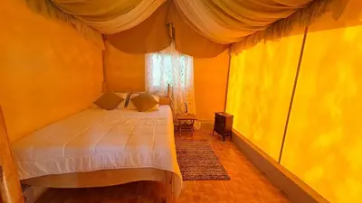 a bedroom with a bed and a window at S Natura Birding and Photography in Villa Mills