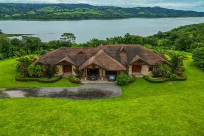 an image of a house with a view of the water at Casa Shamrock Duplex 1 in Unión