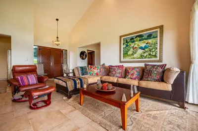 a living room with a couch and a table at Casa Shamrock Duplex 1 in Unión