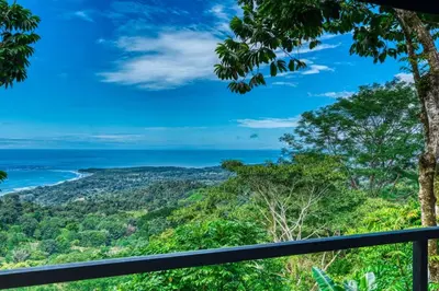 a view of the ocean from the top of a mountain at Bali Villa Jungle Paradise - Uvita in Uvita