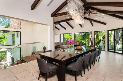 a dining room with a table and chairs at Golf from home! 8BR Lux Villa, Pool, Beach Club! in Playa Avellana