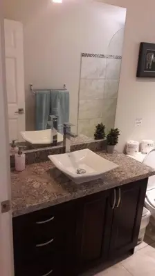 a bathroom with a sink and a mirror at #17A Hermosa Beach Bungalow 1st floor 1 bedroom Apt in Playa Hermosa