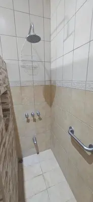 a bathroom with a shower with a toilet at Villa Lagunillas in Lagunillas