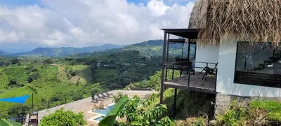a resort with a view of the mountains at Tierra Vital Atenas Villa 2 in Atenas