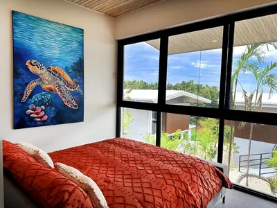 a bedroom with a bed and a large window at Horizon Suite at Solindo Stays in Marbella