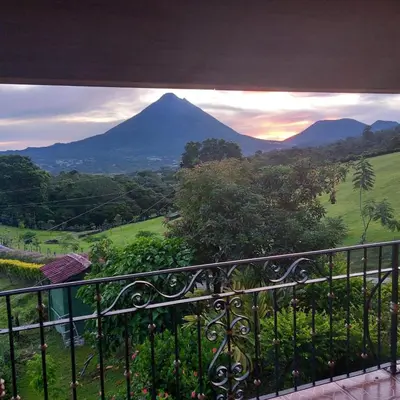 a view of a mountain from a balcony at Villa Esperanza El Castillo in Fortuna
