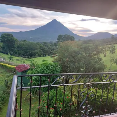 a view of a mountain from a balcony at Villa Esperanza El Castillo in Fortuna