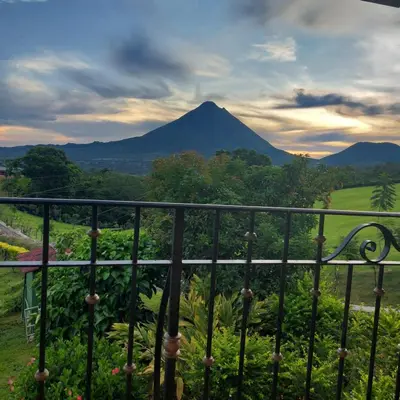 a view of a mountain from a balcony at Villa Esperanza El Castillo in Fortuna