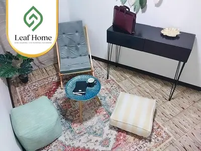 a room with a desk and a chair and a table at Alajuela Leaf Home in Alajuela City