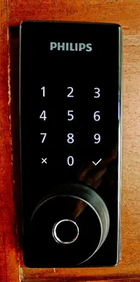 a close up of a remote control for a microwave at Holly House La Fortuna in Agua Azul
