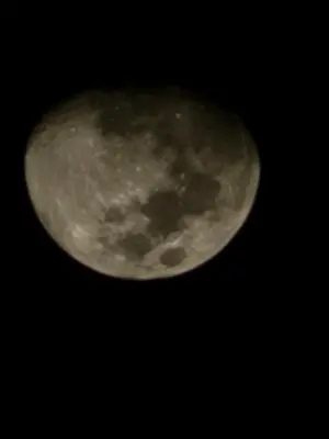 a close up of a moon in the sky at Villas Atardecer Tamarindo in Santa Rosa