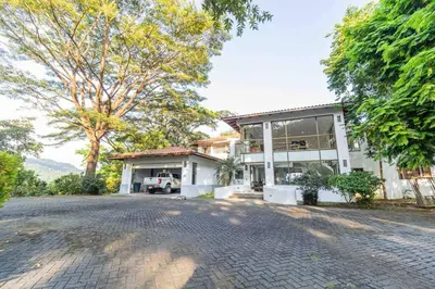 an image of a house with a driveway at Private Beach Mansion Ocean View at Tambor Hills in Tambor