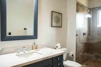 a bathroom with a sink and a shower at Las Ventanas del Mar-Ridge Condo #13 in Santo Domingo