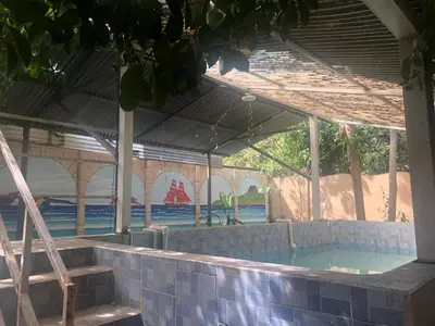 a swimming pool in a building with a swimming pool at Tucan in Coco