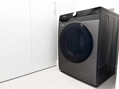 a black and gray microwave oven sitting in a room at Ocean Front, Luxurious Condo in Downtown Jaco! in Jacó
