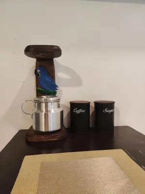 a coffee maker and two cups on a table at Pura Vida Rentals in Cabuya