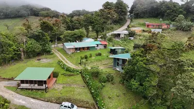 an aerial view of a house on a hill at Dadirri Cozy House Santa Elena Monteverde in Monteverde Costa Rica