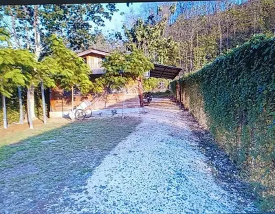 a stone path with a fence and a building at Blue Zone Cozy Cabaña Peaceful Getaway in Santa María
