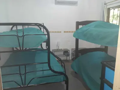 a room with two bunk beds in a room at Blue Zone Cozy Cabaña Peaceful Getaway in Santa María