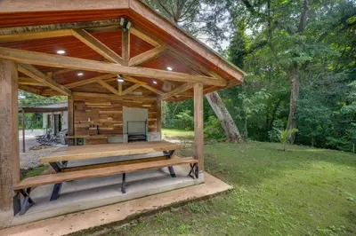 a wooden gazebo in a yard with at Monte Donato 18 - Apt 1 in Playa Avellana