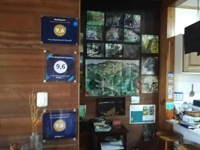 a room with signs on the wall at Finca Queveri in Orosí