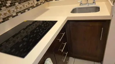 a kitchen with a sink and a stove at Condominio Coco Marindo #34 in Coco