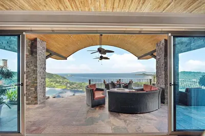 a living room with a view of the ocean at Luxury Retreat Oceanview w Fitness Studio in Playa Hermosa
