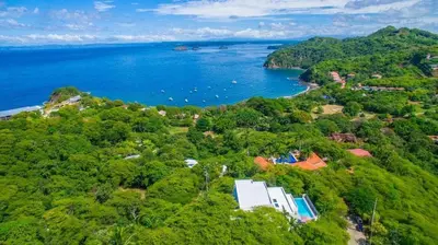 an aerial view of a island with the ocean at Ocean-View Villa, Pool & Concierge in Ocotal