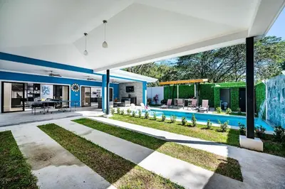 an image of a house with a swimming pool at Private Pool Ping-Pong Table Walk to Beach Villa in Playa Flamingo