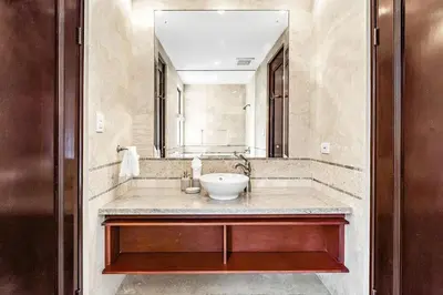 a bathroom with a sink and a mirror at Hilltop Haven with Pool, Terrace and Sea Breeze in Ocotal