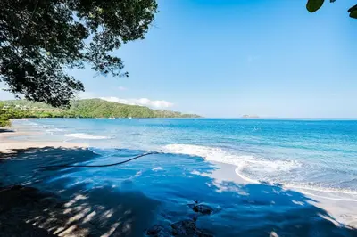 a view of the ocean from the shore of a beach at Spacious Villa Retreat in Private Resort in Playa Hermosa