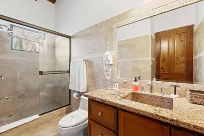 a bathroom with a sink and a toilet at Spectacular Ocean Views Infinity Pool in Potrero