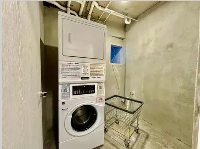 a laundry room with a washing machine in it at Hermoso y Acogedor Studio Sabana, San Jose in San José