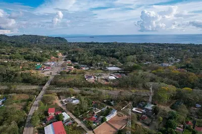 an aerial view of a town with the ocean at Bamboo Relax Uvita in Uvita