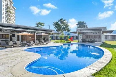 an image of a swimming pool at a hotel at Ocean View Condo at Viva Jaco, Newly Built in Jacó