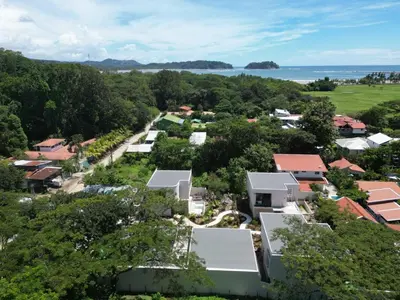 an aerial view of a small town with houses at Soleil Samara in Sámara