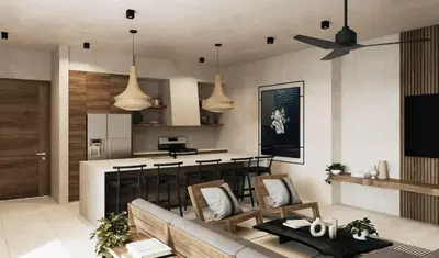 a living room with a couch and a kitchen at Soleil Samara in Sámara