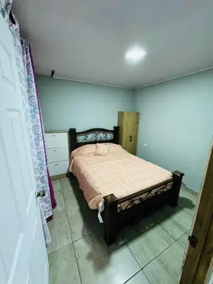 a bedroom with a bed in a room at Difas in Coyol