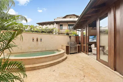 a backyard with a swimming pool and a house at Beautiful Villa Walk to Beach in Playa Danta