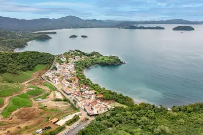 an island in the middle of a body of water at Beautiful Villa Walk to Beach in Playa Danta