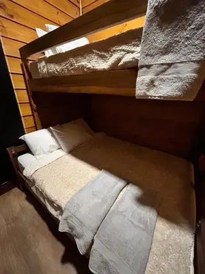 a bedroom with two bunk beds in a room at Eco Casa Mango Lepanto #9 in Lepanto