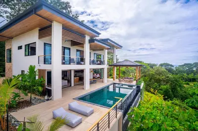 an image of a house with a swimming pool at Villa del Cielo - by Pura Villas in Uvita