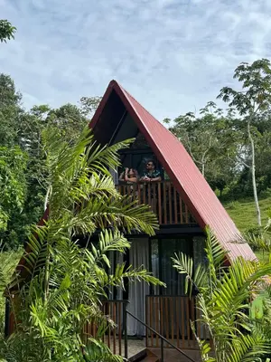 people on the balcony of a tree house at Small Country House in Monterrey
