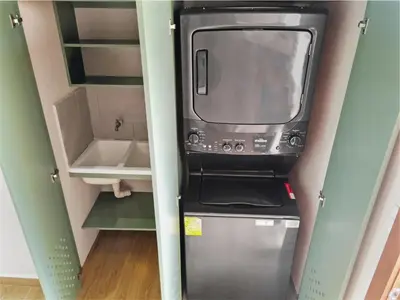 a microwave oven sitting inside of a small kitchen at Serene Hills in Fortuna