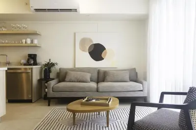 a living room with a couch and a table at J-PacP506 condo in Jacó